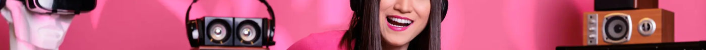 Woman in pink shirt with black headphones for gymnastics floor music