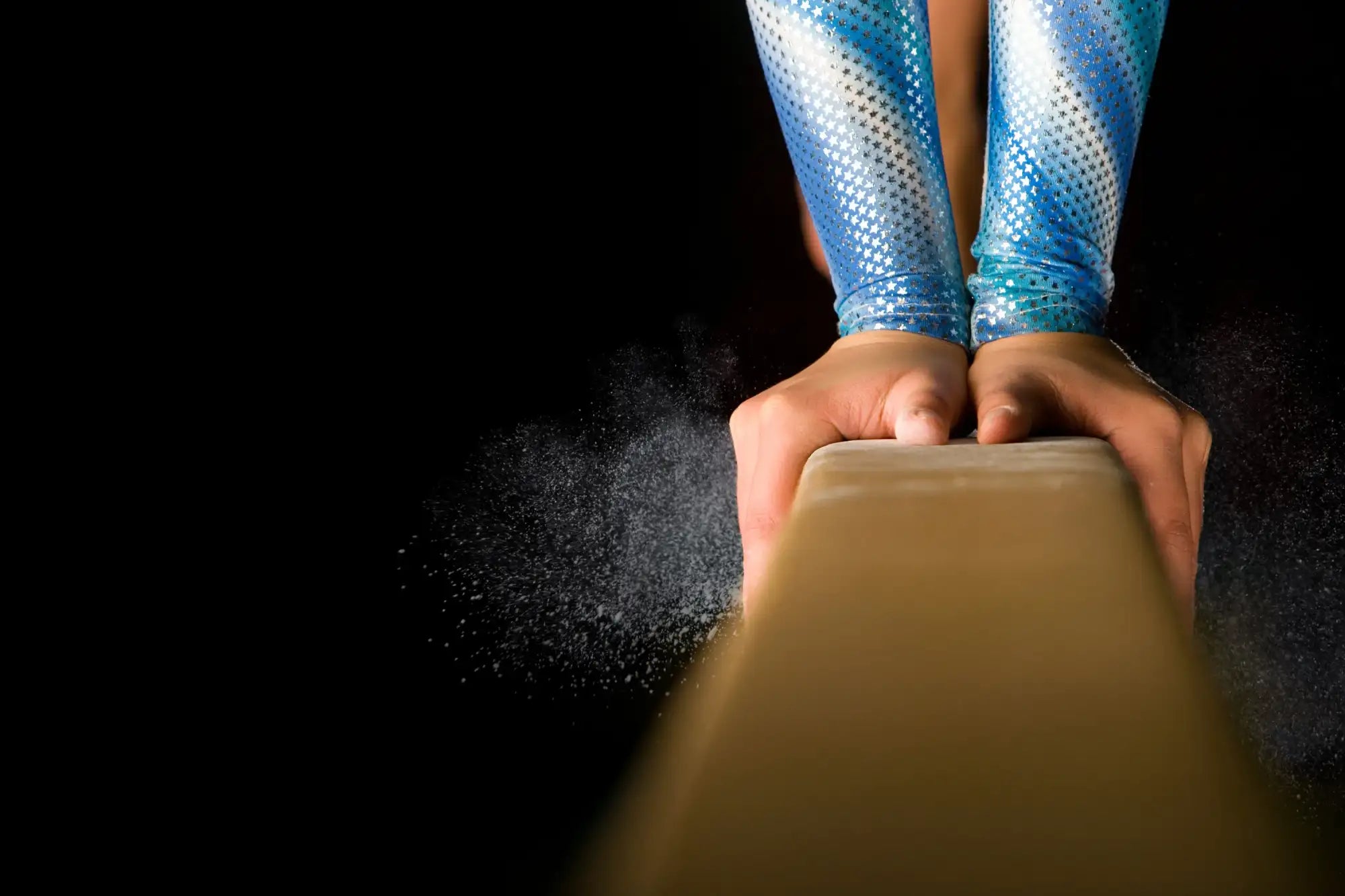 Sparkly blue and white leotard sleeves for NCAA Women’s Gymnastics Championships