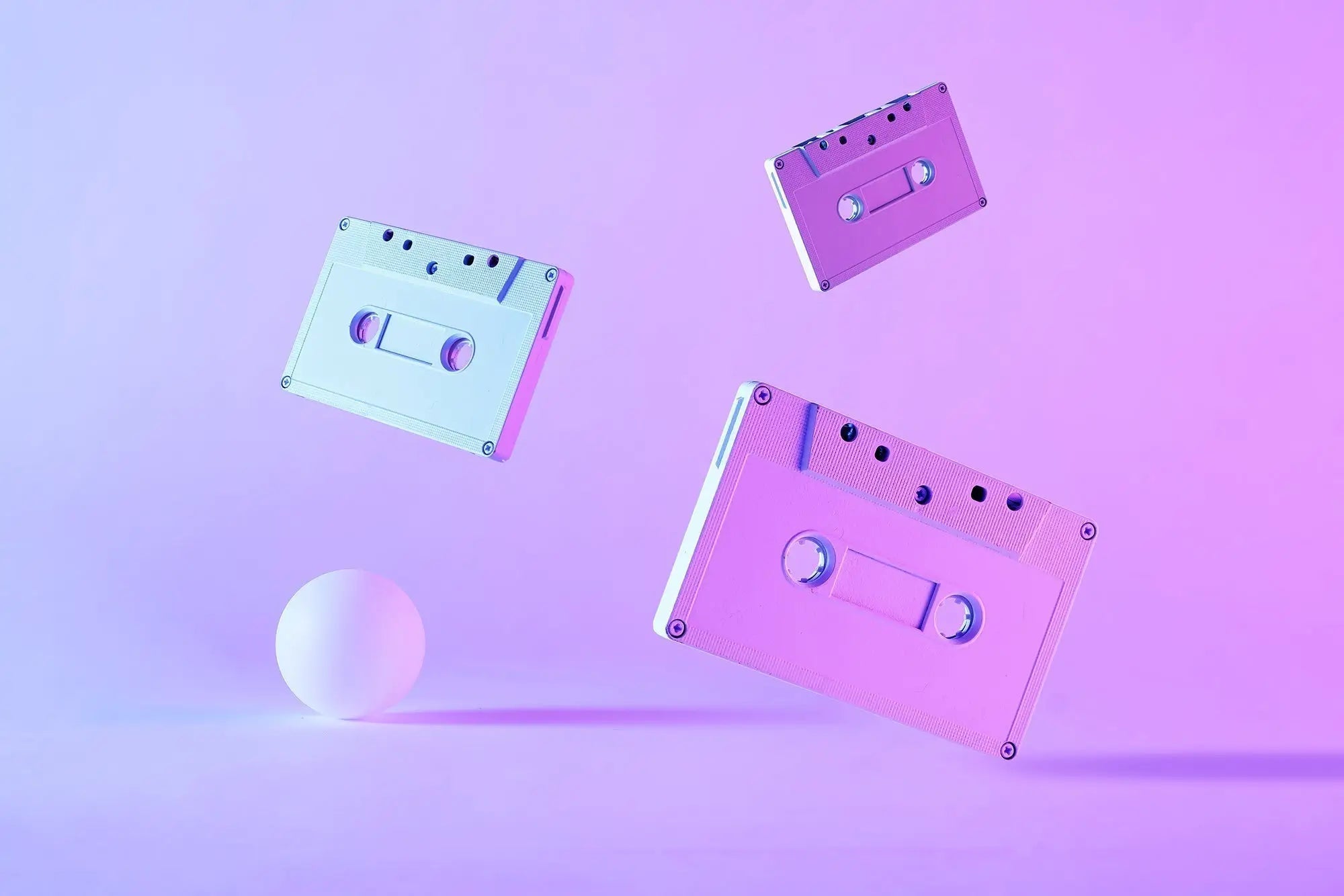 AI-generated translucent pastel cassette tapes for gymnastics floor music on purple gradient