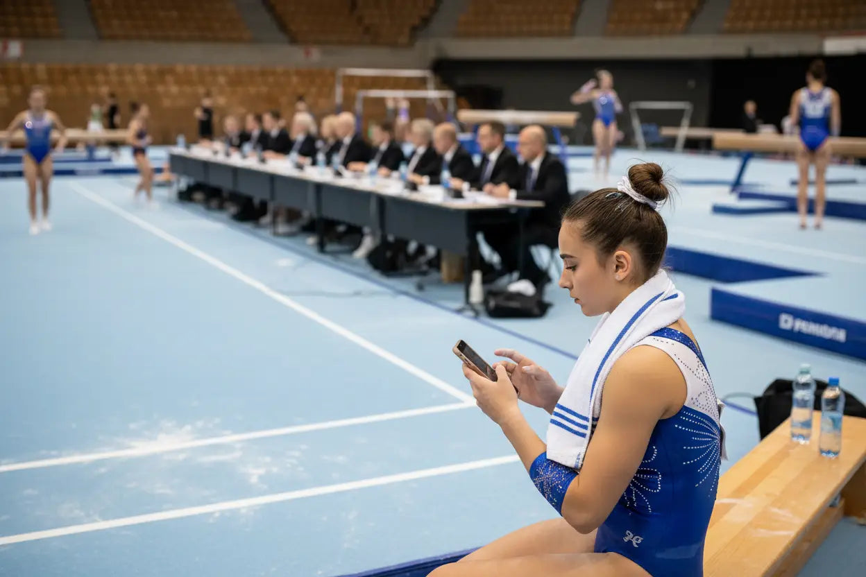 Blue and white gymnastics leotard with sparkly embellishments perfect for women’s gymnastics competitions and floor music routines