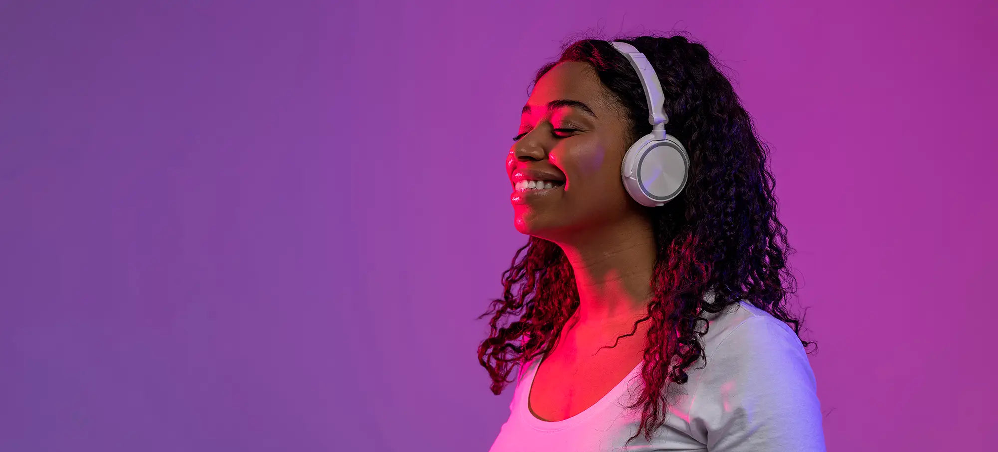 Sleek white over-ear headphones for perfect beat in floor routine