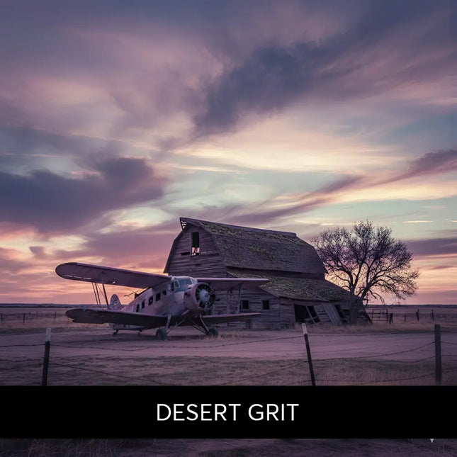 Vintage silver biplane in front of weathered barn at twilight sets the tone for desert grit gymnastics floor music