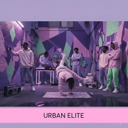 A person in a pink hoodie and pants does a handstand on a patterned mat for urban elite hip-hop gymnastics floor music