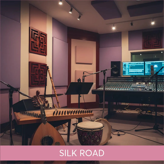 A decorative djembe drum with purple and gold patterns, natural wood body, and white head for silk road middle eastern gymnastics floor music