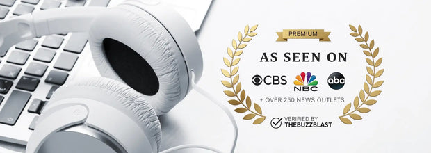 White over-ear headphones with soft, padded earcups and a sleek, minimalist design.